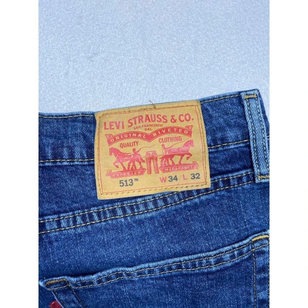 Levis 513 Slim Straight Jeans Mens 34x32 Blue Denim Distressed Paint Splatter